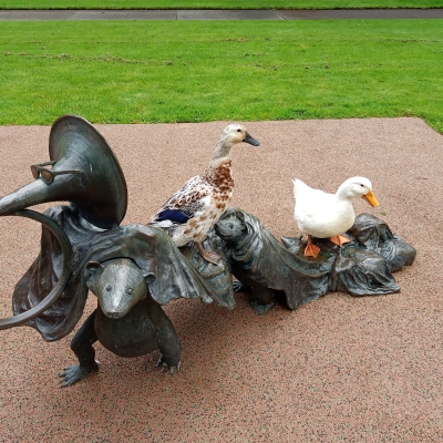 Kiwi and Misha visiting the capitol building city park. 
